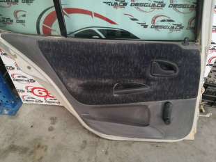 GUARNECIDO PUERTA TRASERA...